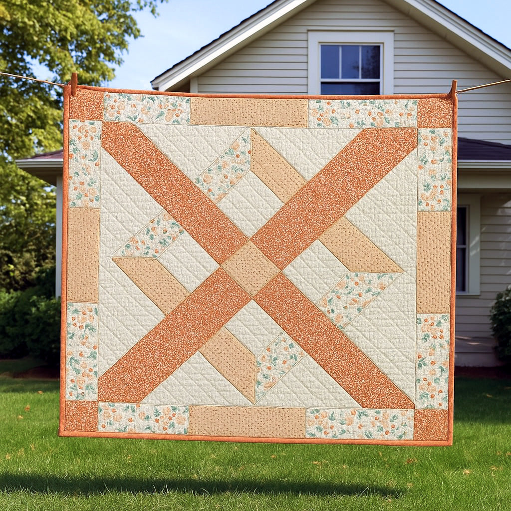 The X Frame Quilt Downloadable PDF Quilt Pattern features an orange and cream geometric design, shown here hanging on a clothesline in front of a white-sided house with a green lawn.